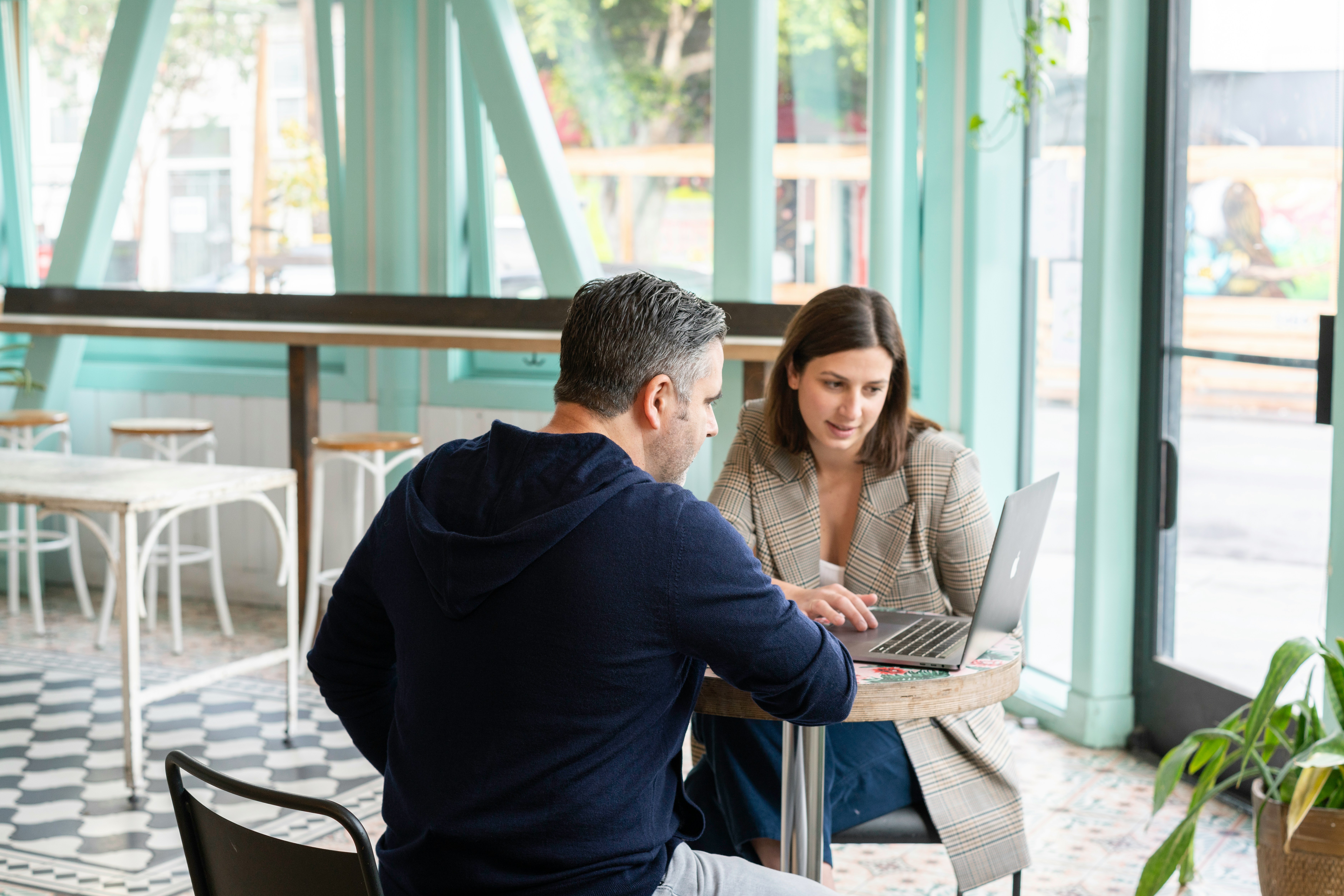 man and woman working together - Brainstorm Ideas for Writing